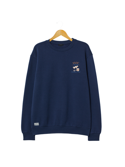 Sudadera Cocktail Club SNOC color Azul Marino, vista frontal con el bolsillo bordado, fondo transparente